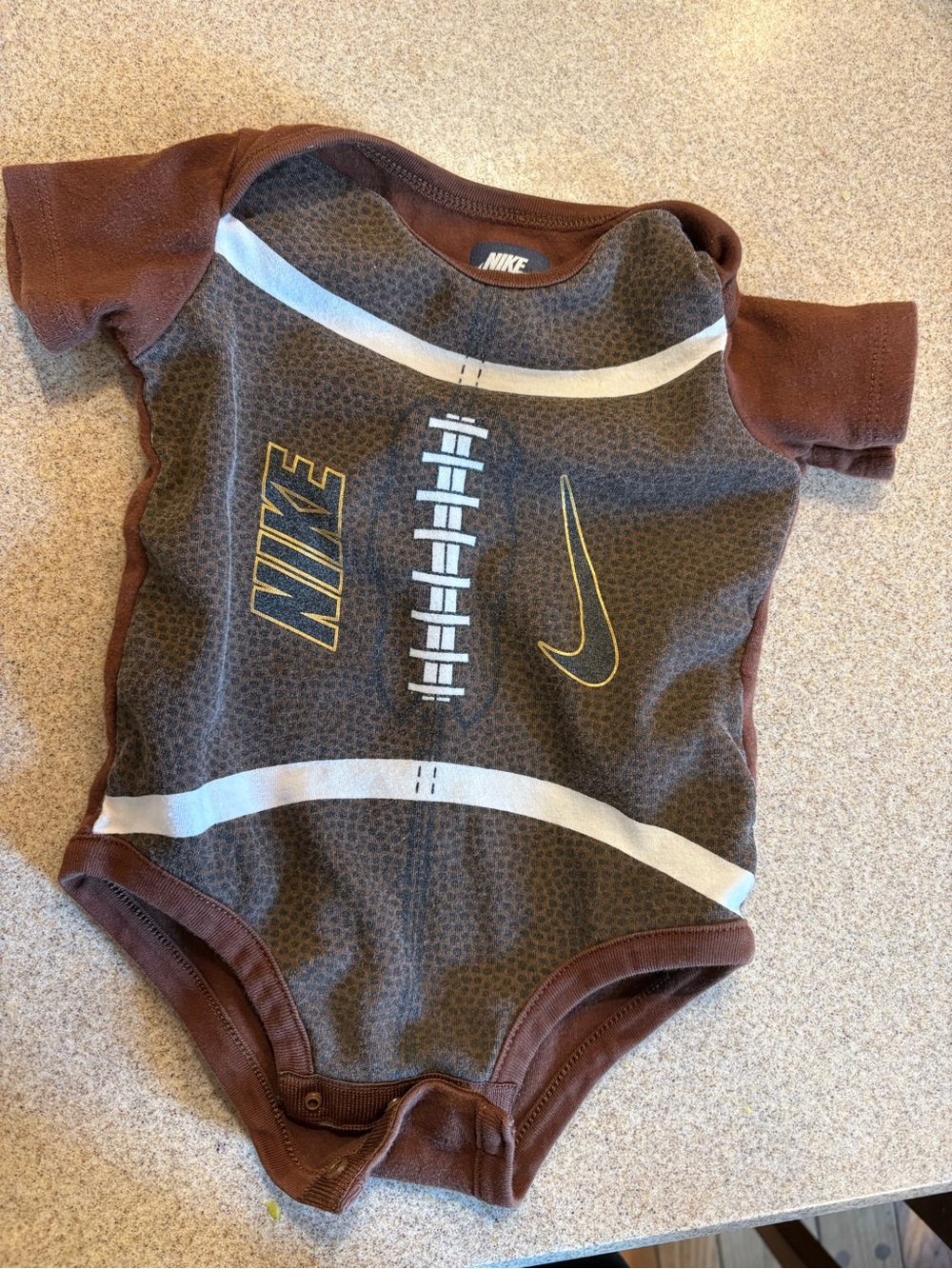 Nike baby onesie football size 6-9months